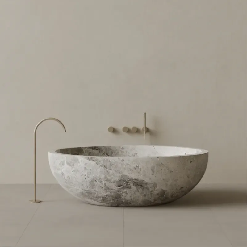 ELEMENTO BATH | 69" x 45" SKILLFULLY MADE OVAL STONE BATHTUB | $13,808.00 - $55,898.00