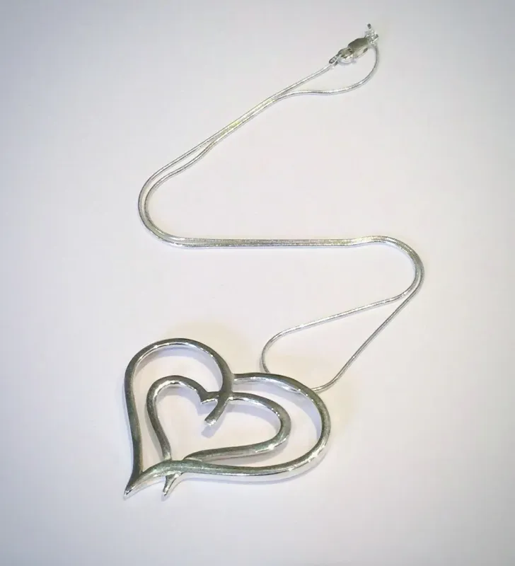 Spacious Double Heart Pendant