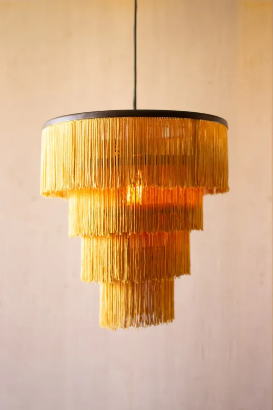 Gold fringe tiered pendant airy