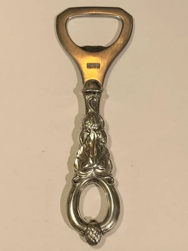 Carl M. Cohr Sterling Bottle Opener
