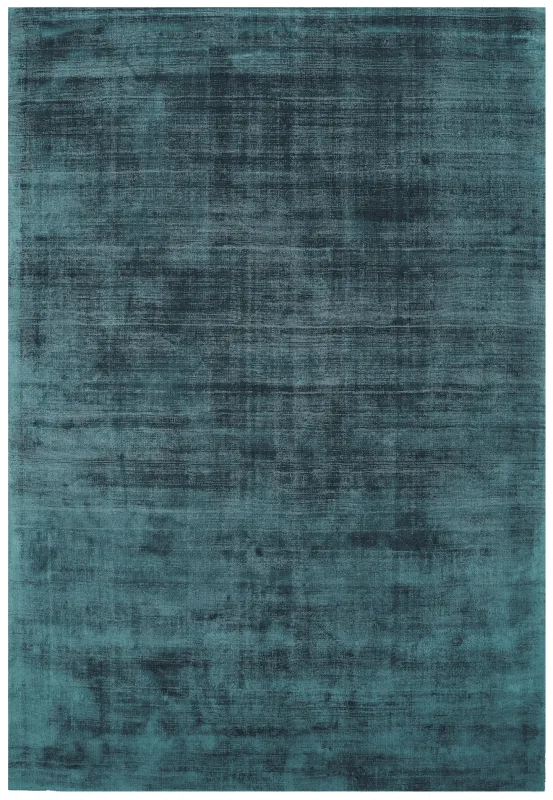 Magnetic Blade Peacock Plain Rug