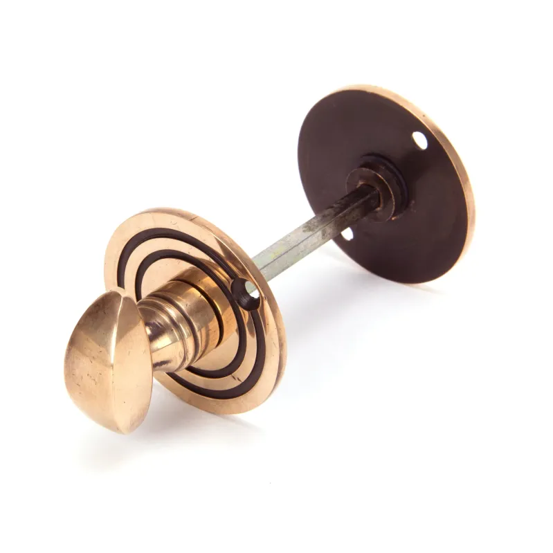 Polished Copper-brown Round Bathroom Thumbturn | From Anvil Drywall Installation