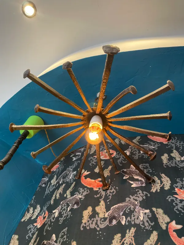 Rustic chandelier crafted old nails