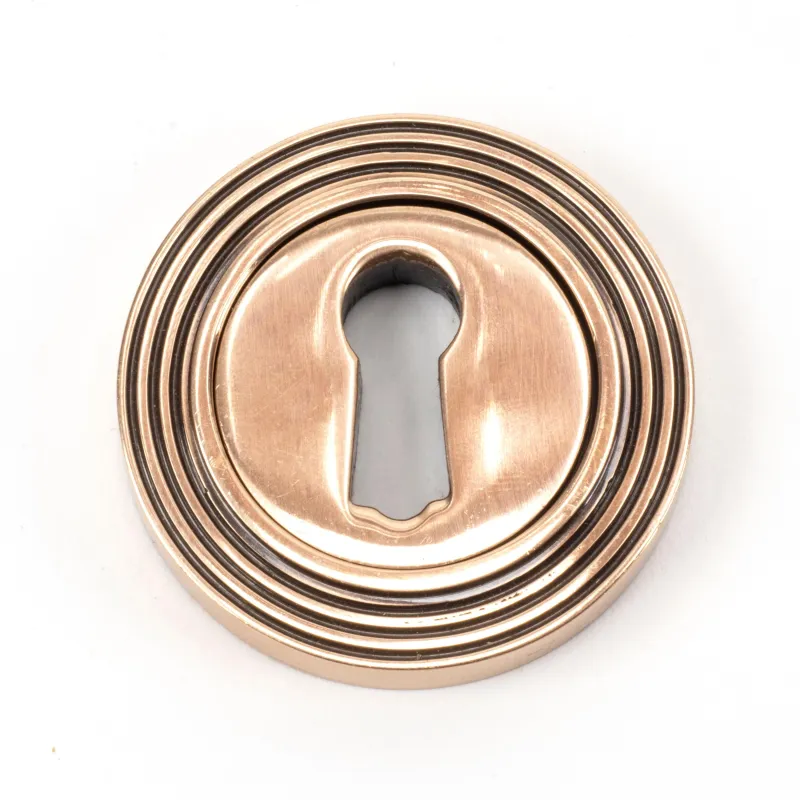 Shiny Bronze Round Escutcheon (Beehive) | From Anvil